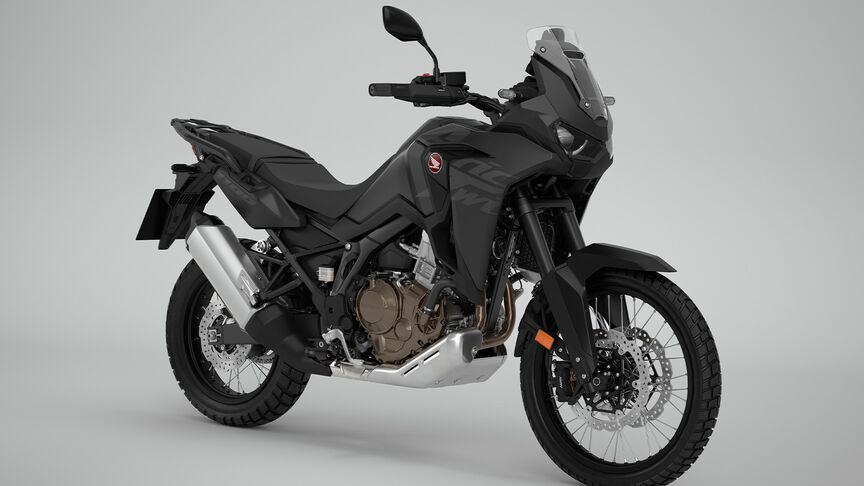 Vista dianteira a 3/4 da Honda CRF1100 Africa Twin em estúdio