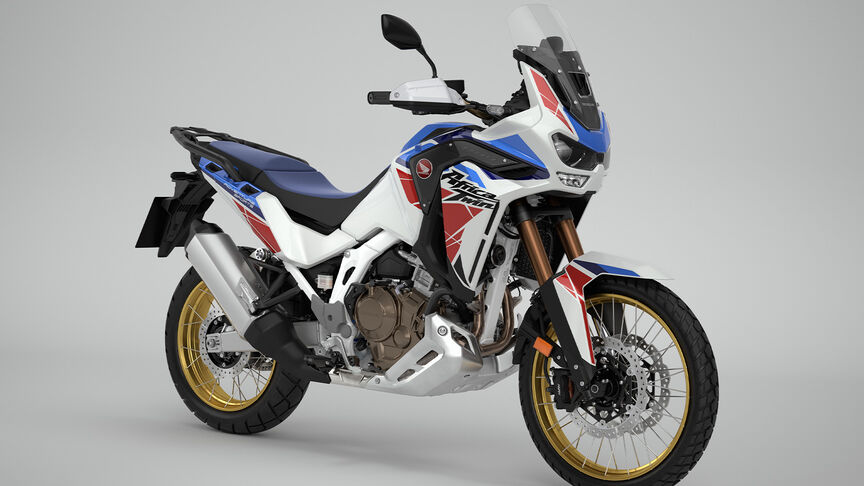 Vista dianteira a 3/4 da Honda CRF1100 Africa Twin em estúdio