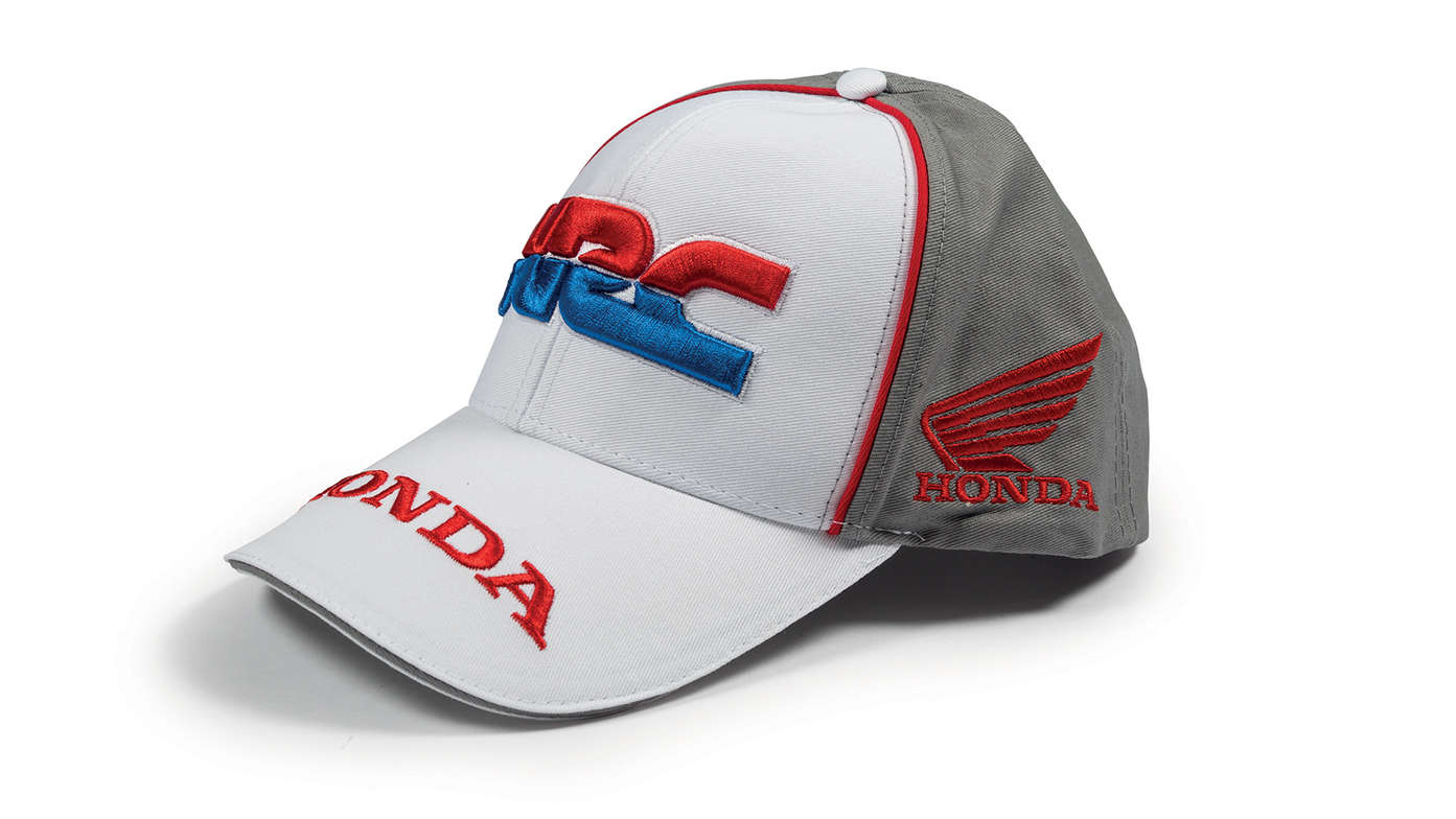 Boné de basebol com as cores da equipa Honda HRC e o logótipo da Honda Racing Corporation.