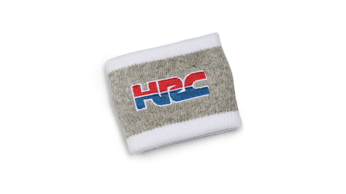 Pulseira cinzenta da Honda HRC nas cores da HRC com o logótipo da Honda Racing Corporation.