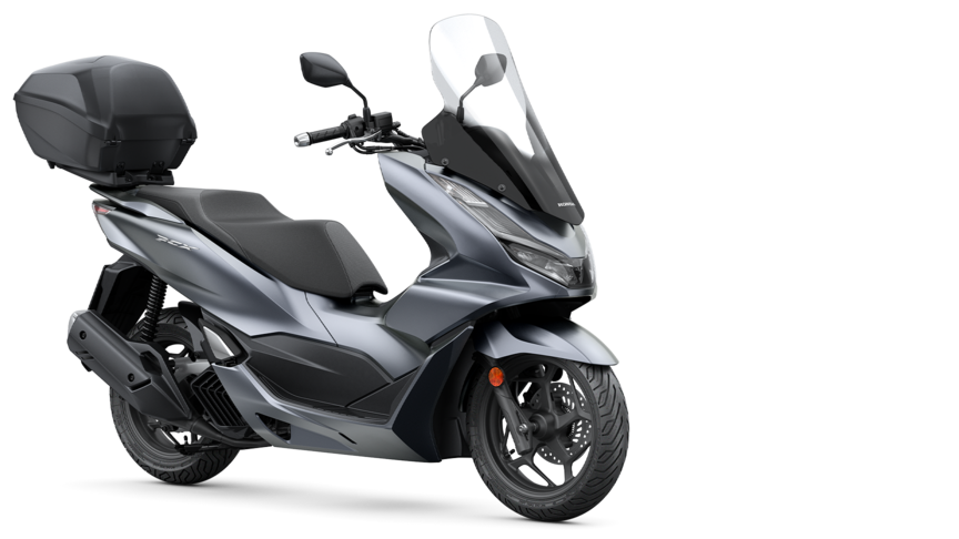 Honda PCX125 - Vista a três quartos dianteira direita, fotografia de estúdio, moto vermelha