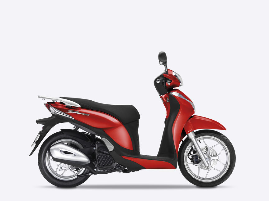 Perspetiva lateral de uma scooter SH Mode branca.